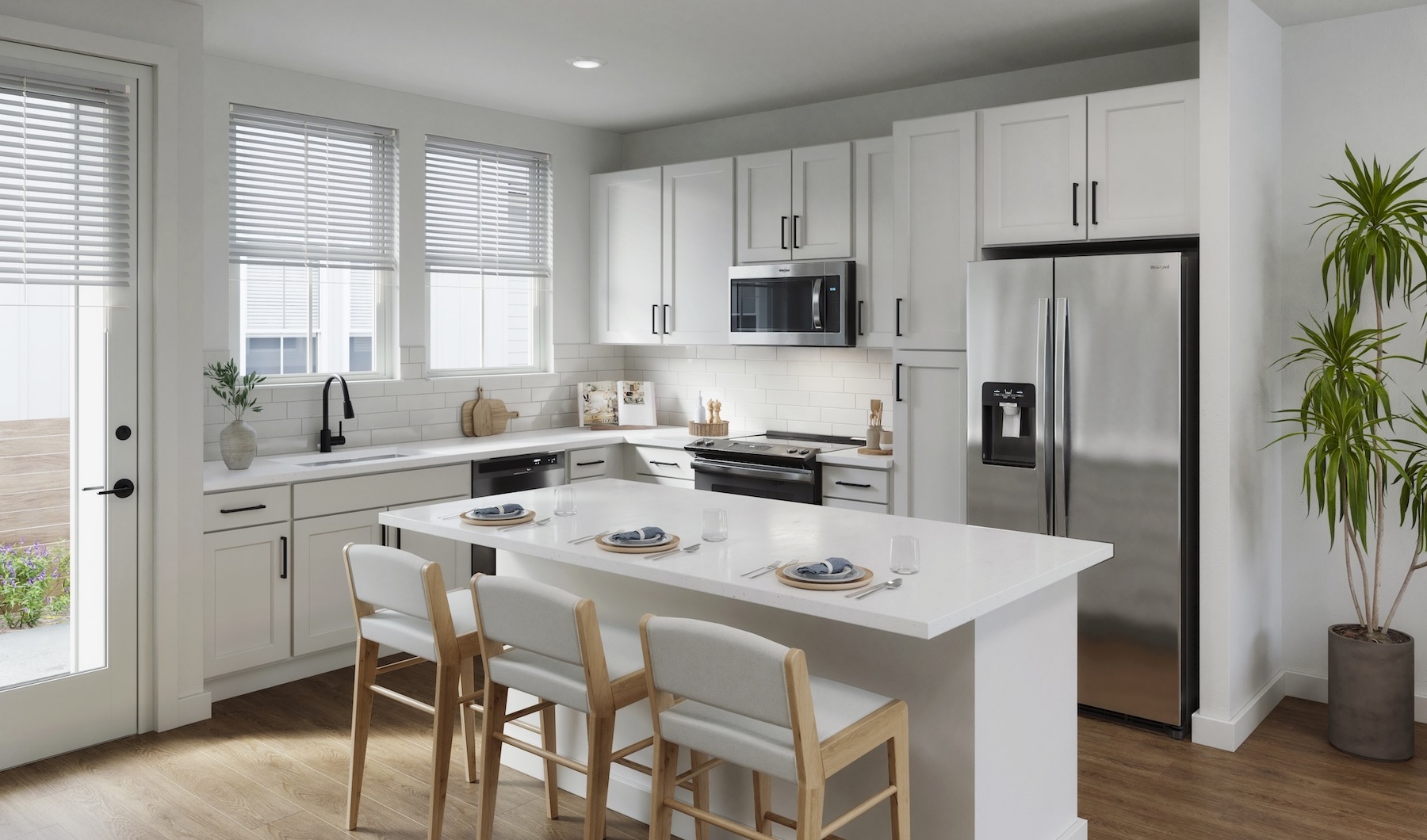 a kitchen with white cabinets